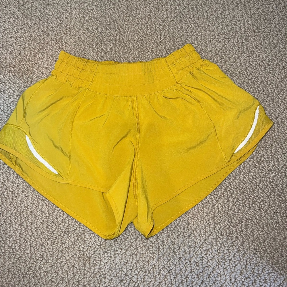 Mustard yellow Women’s lululemon hotty hot shorts